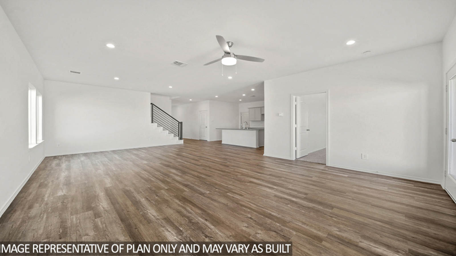 Open concept living, dining, and kitchen area