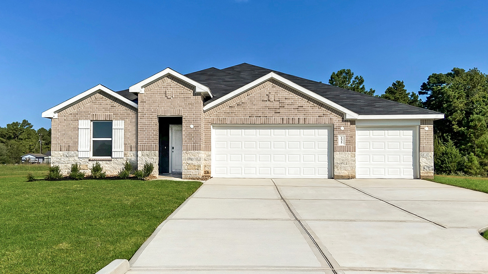 One story home with three car garage