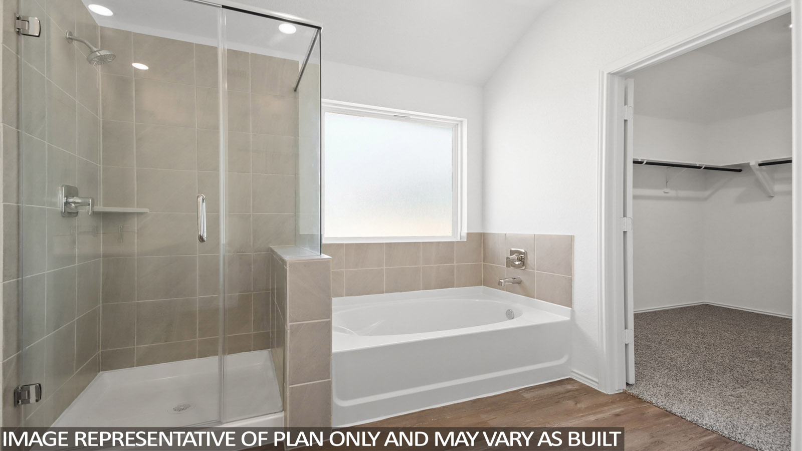 Primary bathroom with tub and shower