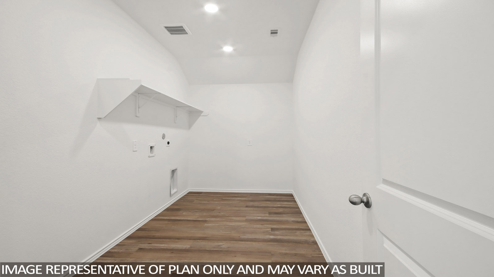 utility room with vinyl flooring