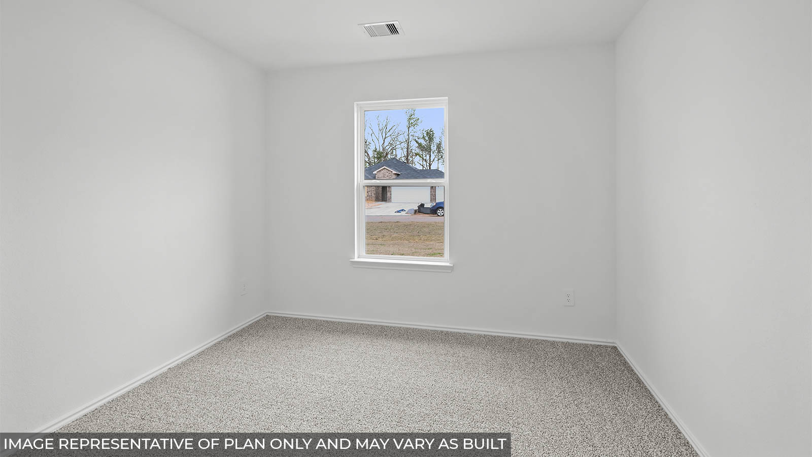 secondary bedroom with carpet flooring