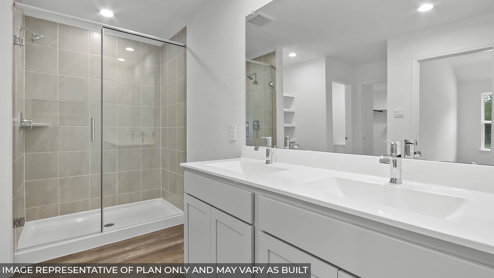 primary bathroom with double sink and standings shower