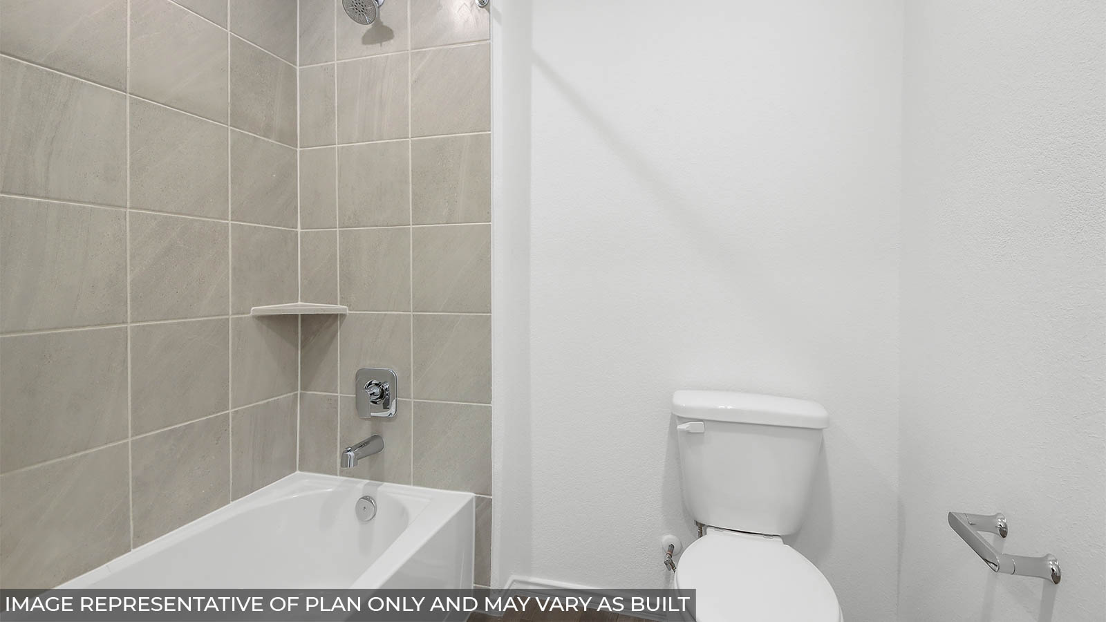 Secondary bathroom with a separate room consisting of a tile tub/shower combo and a toilet.