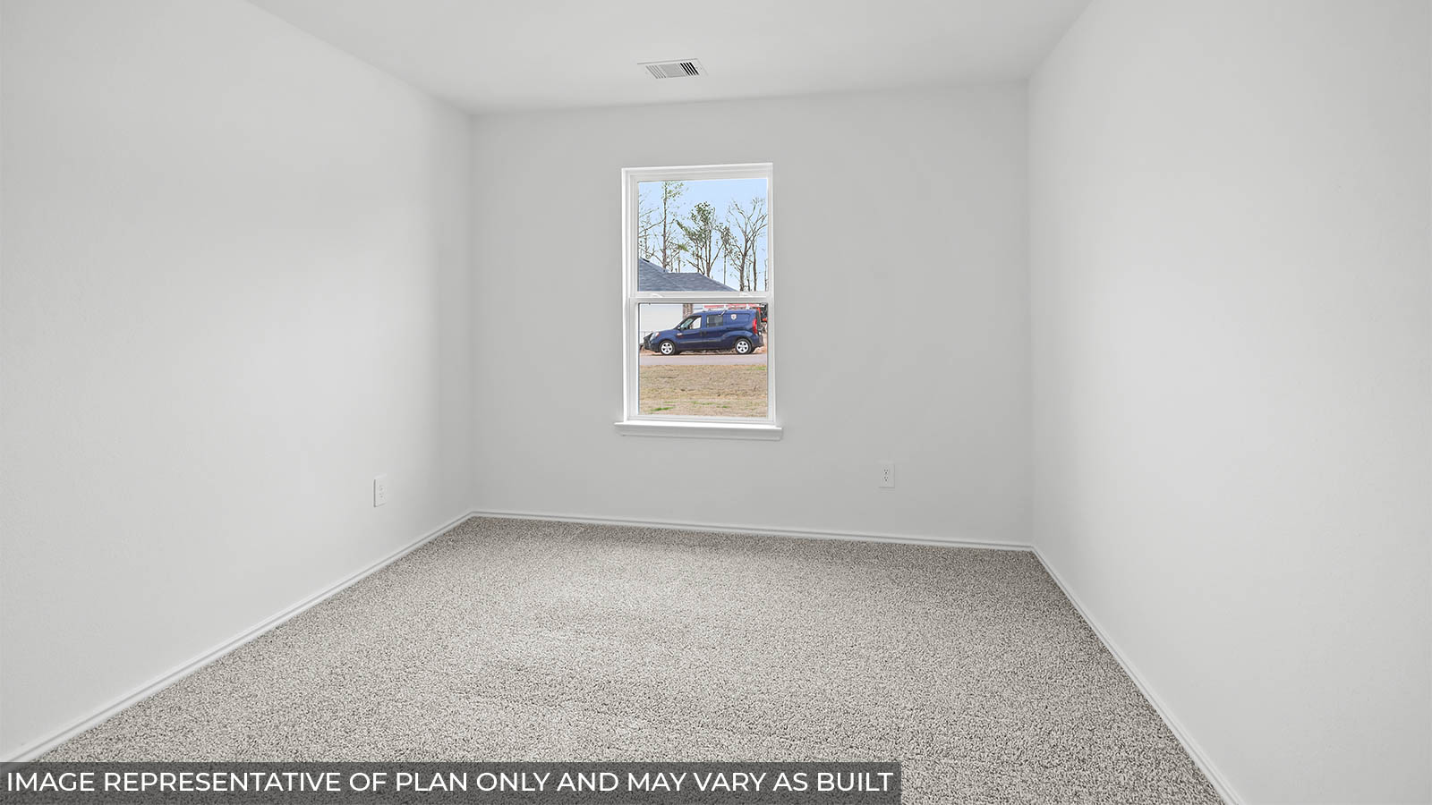 Secondary bedroom with carpet flooring and a bright window.
