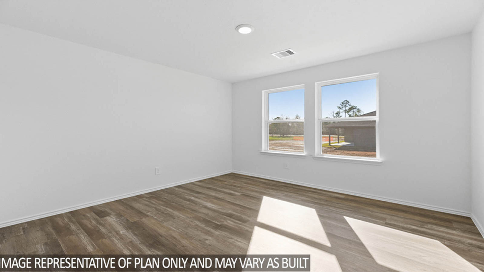 Private study with vinyl flooring and bright windows.