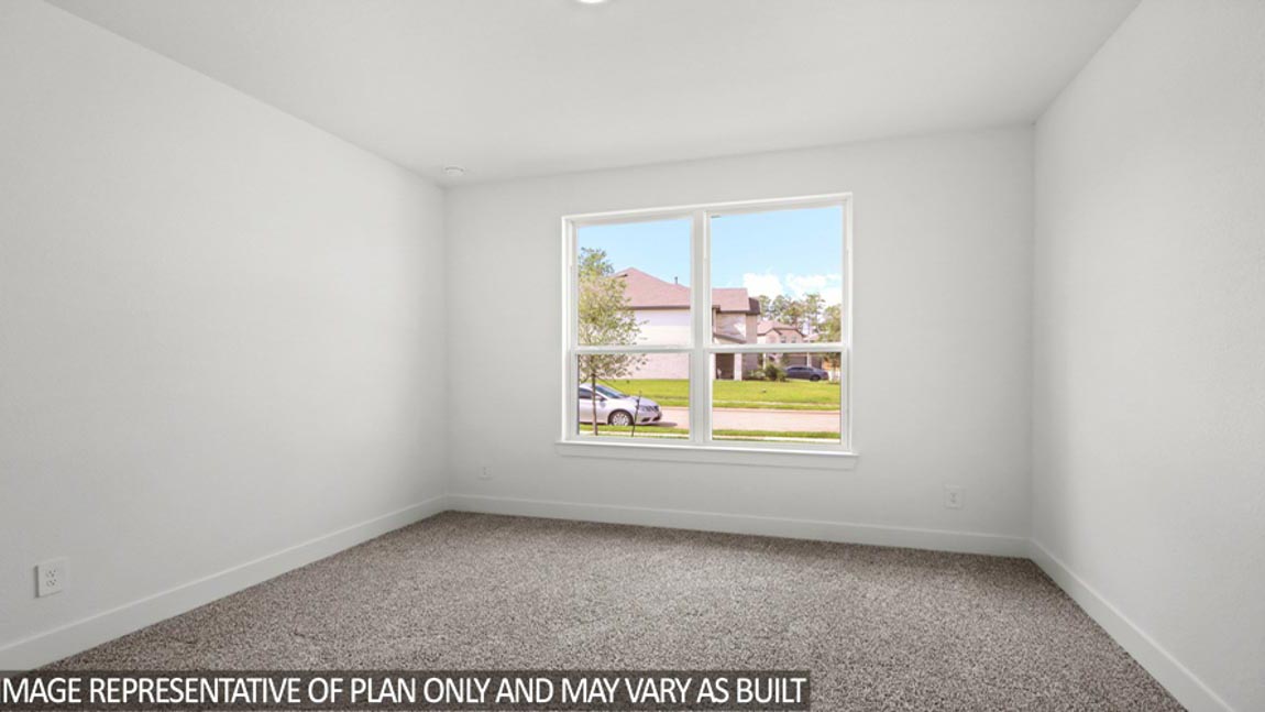 Secondary bedroom with bright window