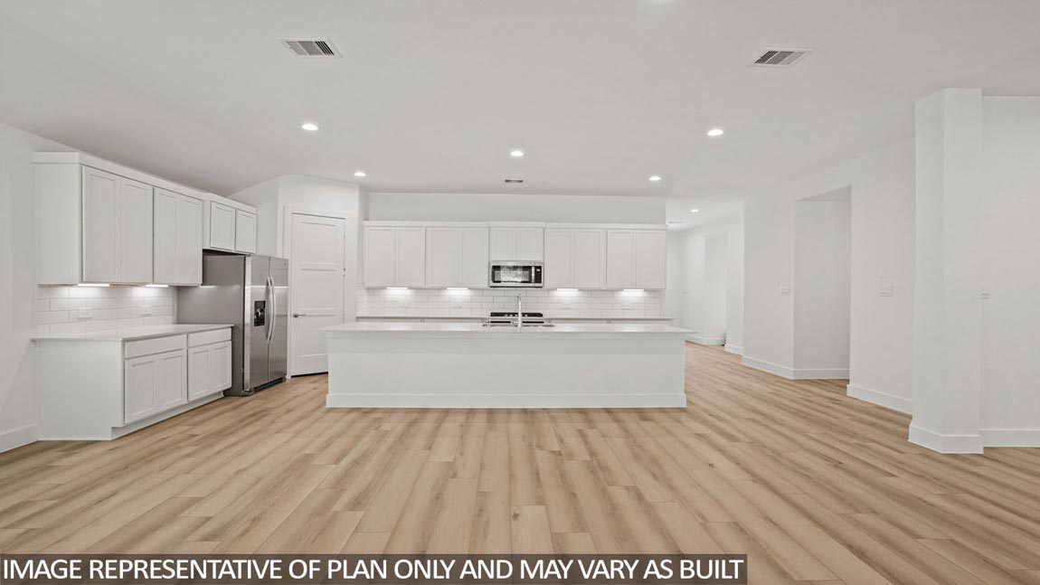 Open concept living, dining, and kitchen area