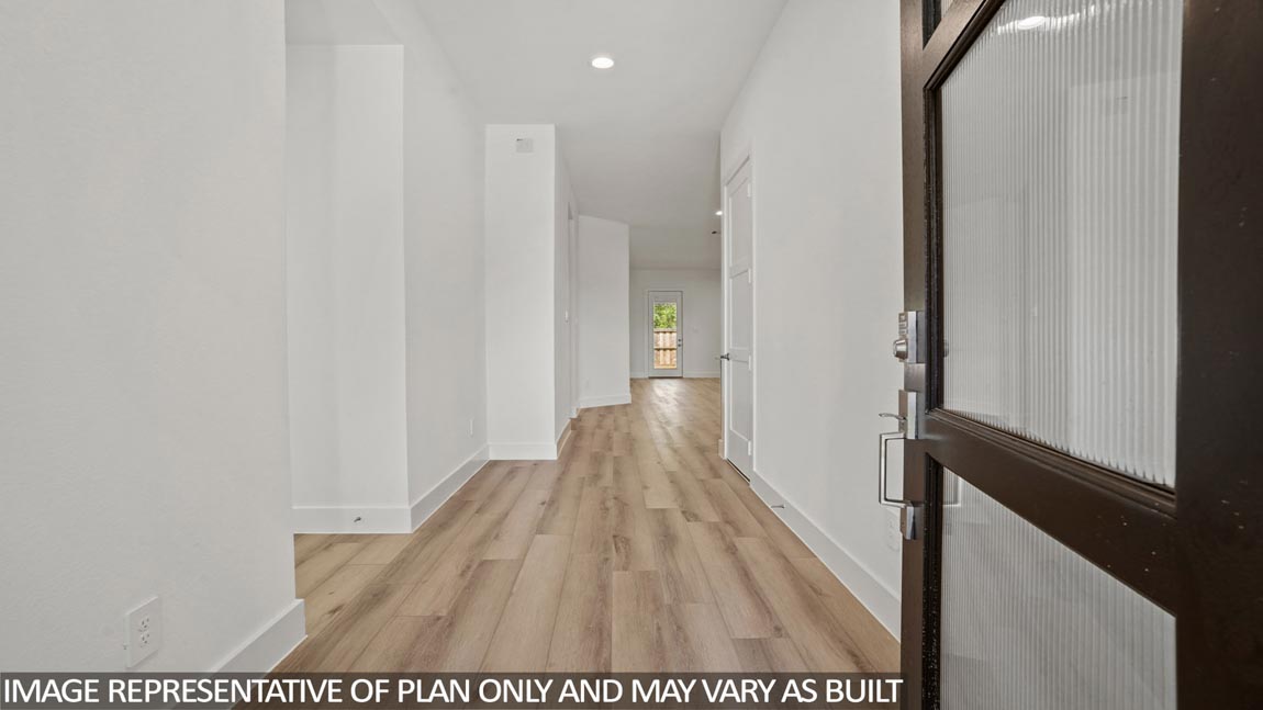 Entry hallway with vinyl flooring