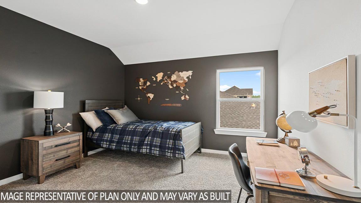 secondary bedroom with carpet flooring