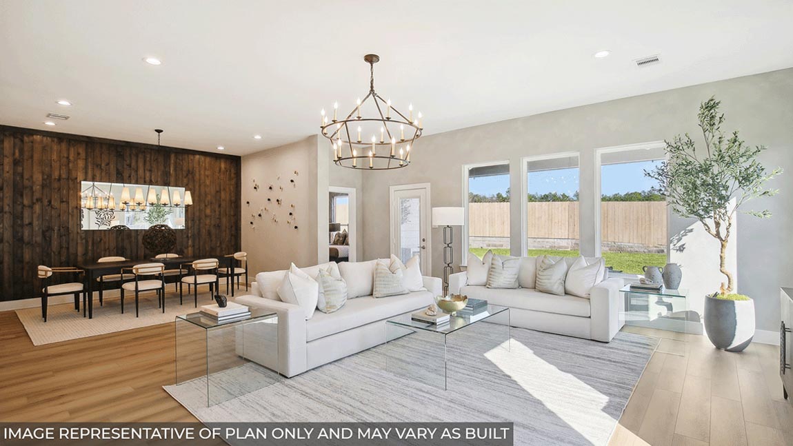 Spacious living area with vinyl flooring