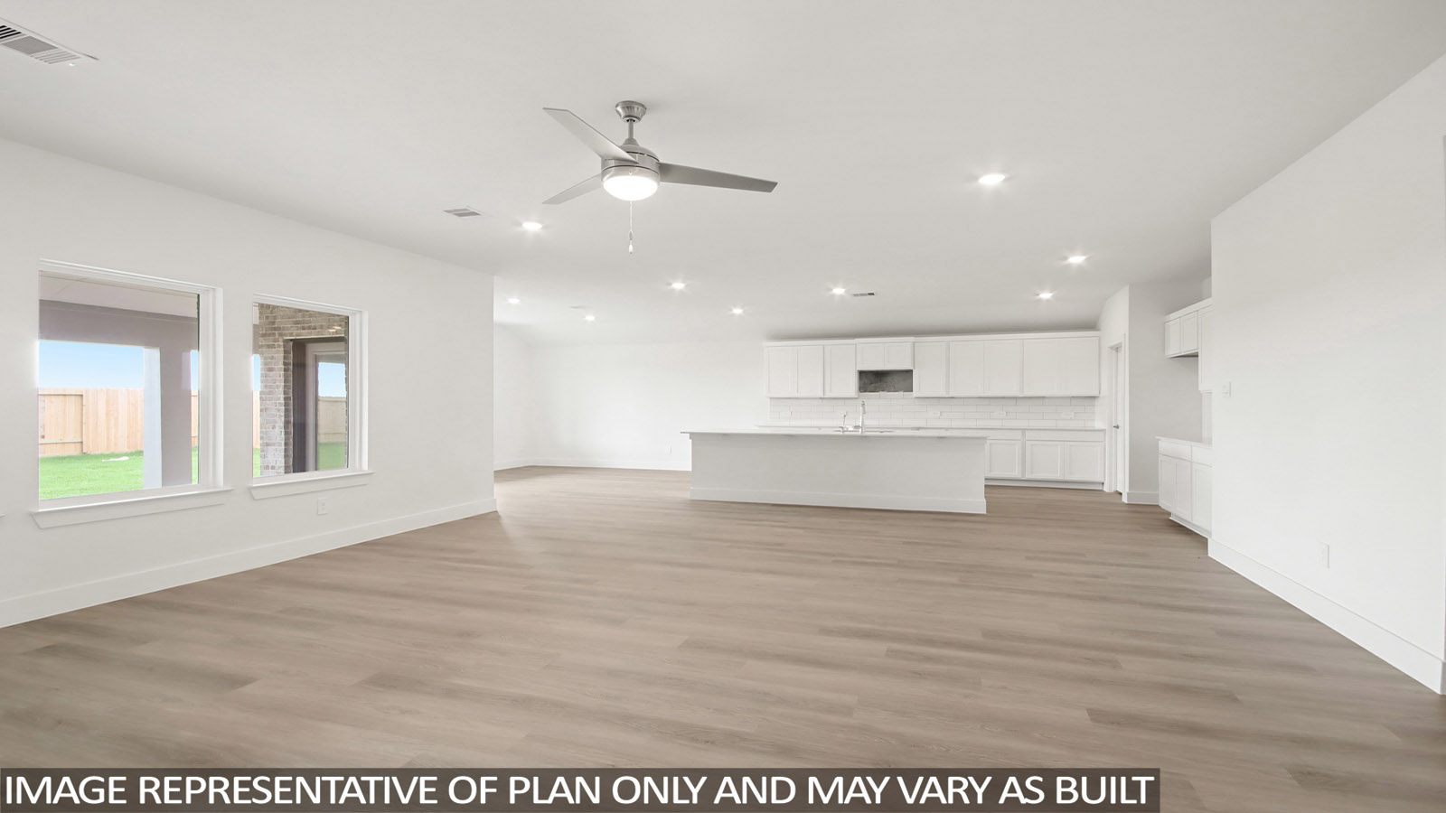 Open concept living, dining, and kitchen area