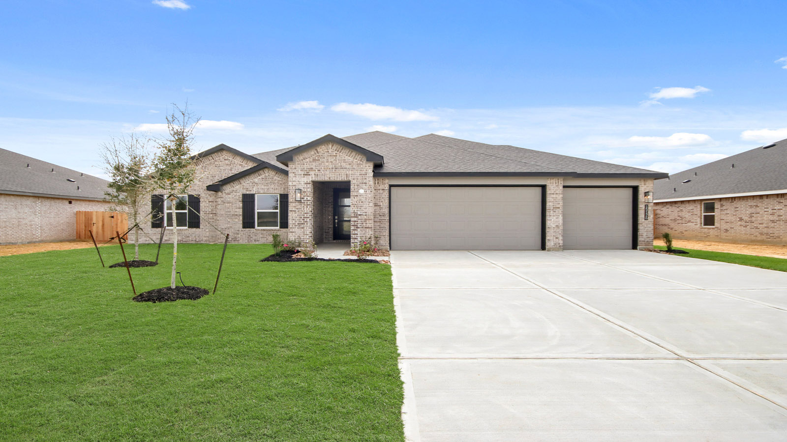 Single Story Brick Home. 3 Car Garage