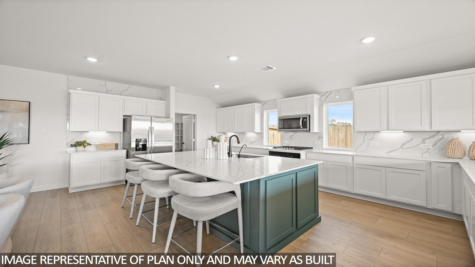 Kitchen with an island and vinyl floor