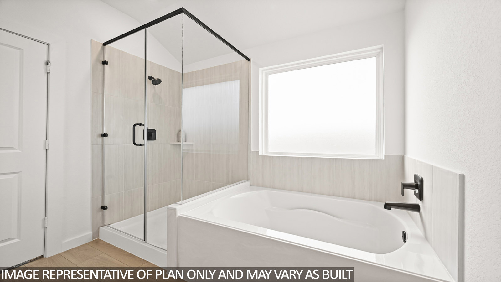 Primary bathroom with tub and shower