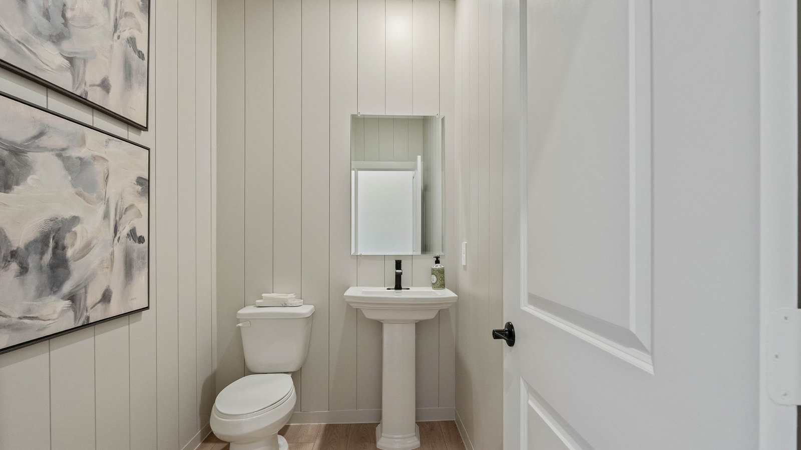 Powder bathroom with pedestal sink