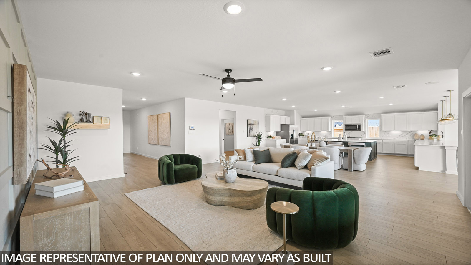 Spacious living area with vinyl flooring