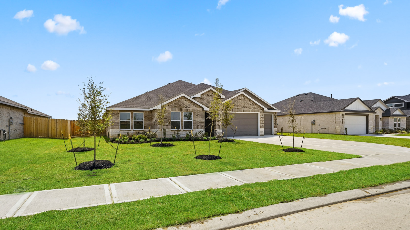 single story home with 3 car garage