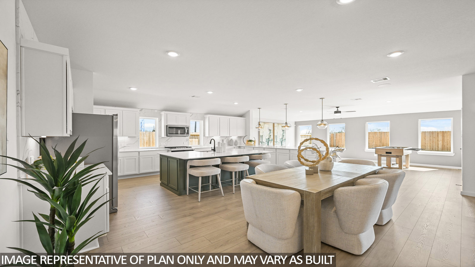 Open concept living, dining, and kitchen area