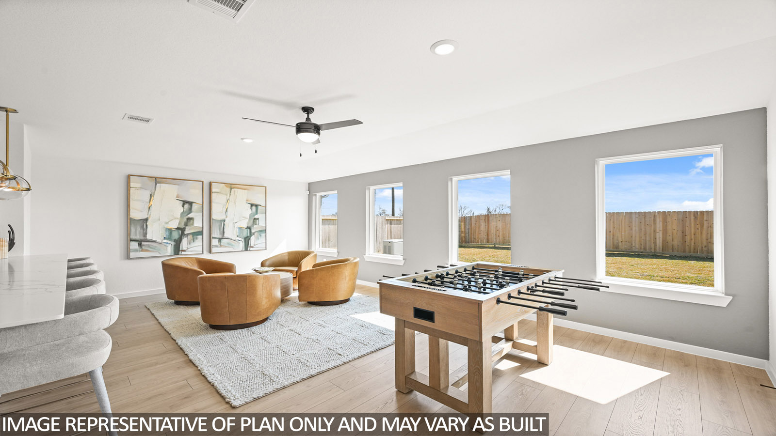 entertainment room with bright windows