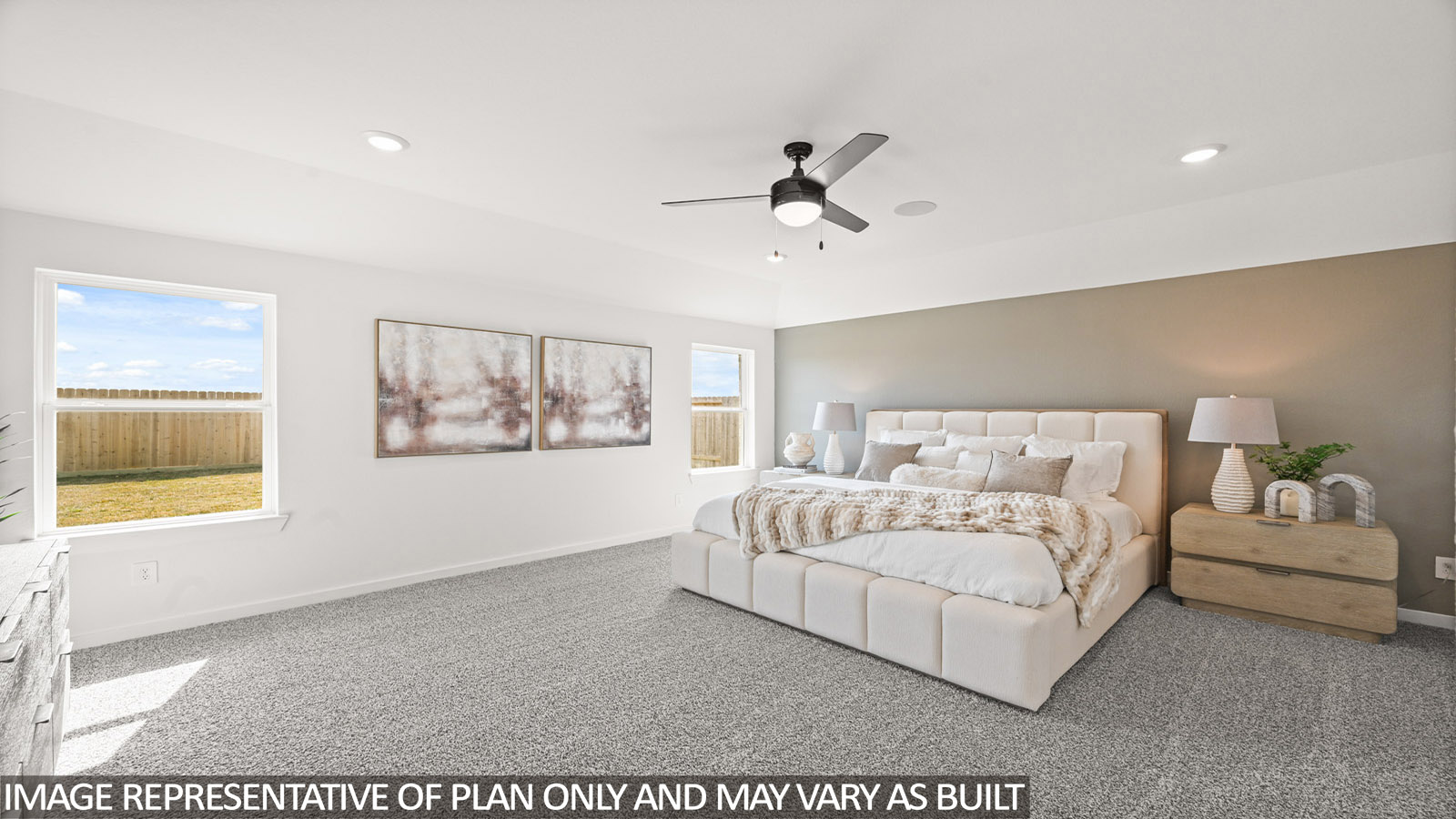 Primary bedroom with carpet flooring
