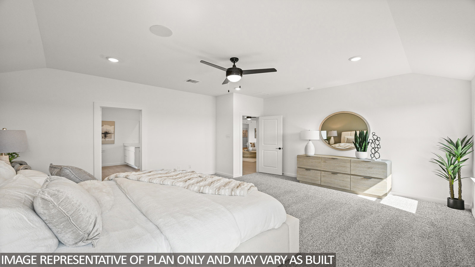 Primary bedroom with bright windows
