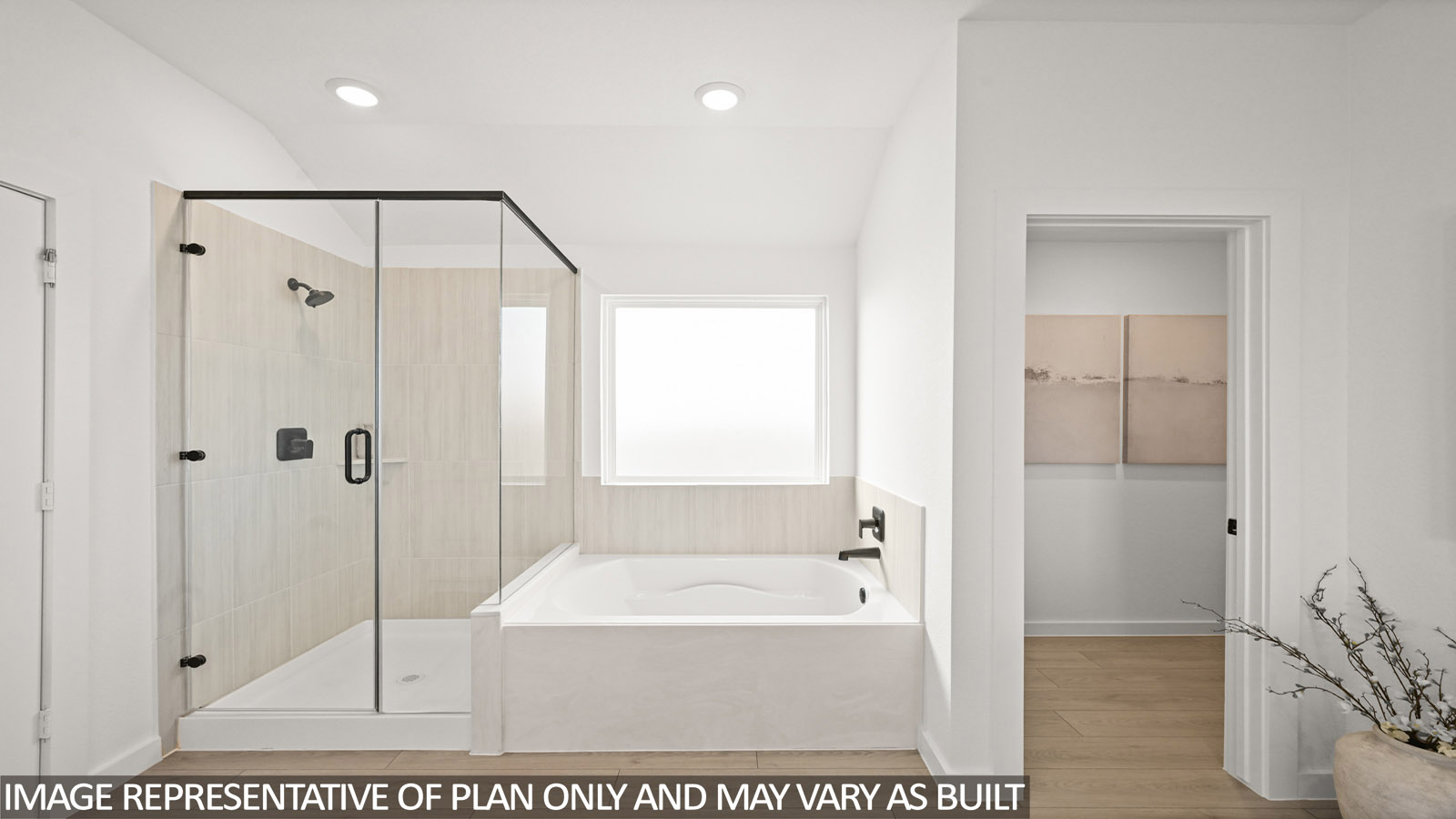 Primary bathroom with tub and shower
