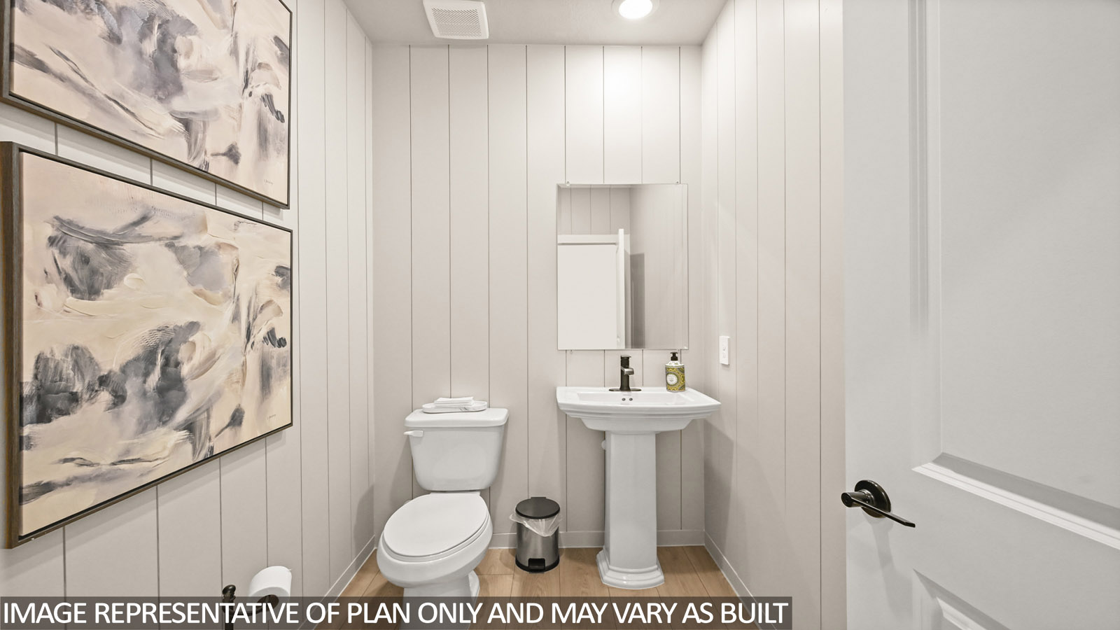 Powder bathroom with pedestal sink