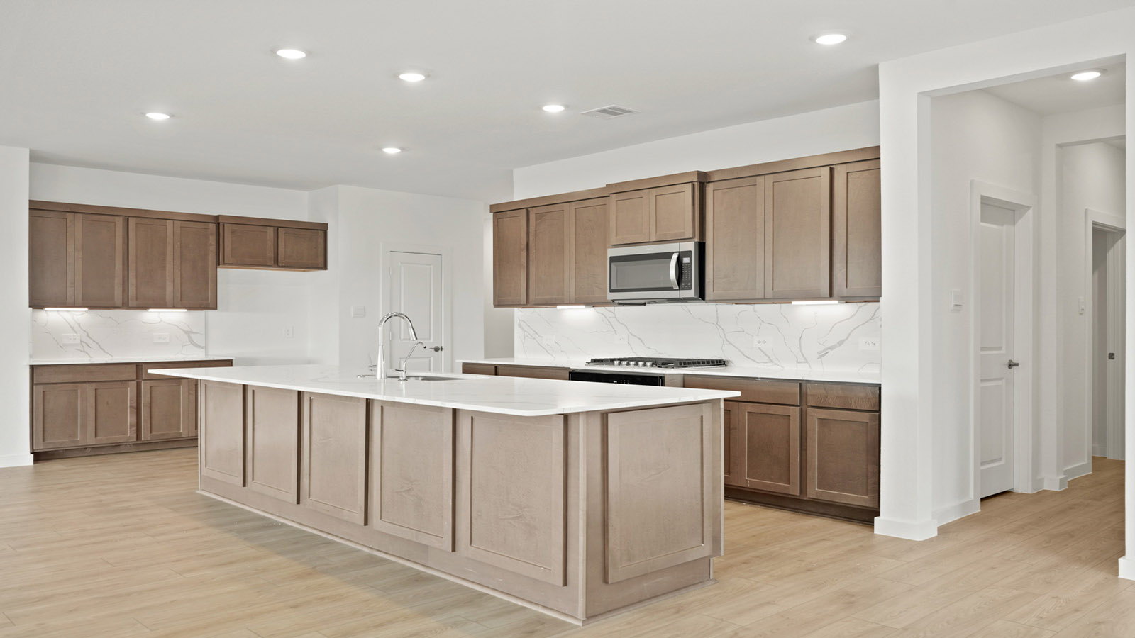 L- shaped kitchen with an island