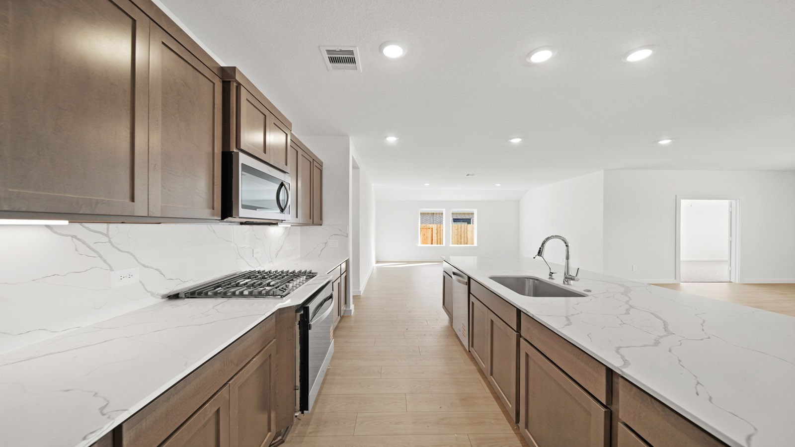 L- shaped kitchen with an island