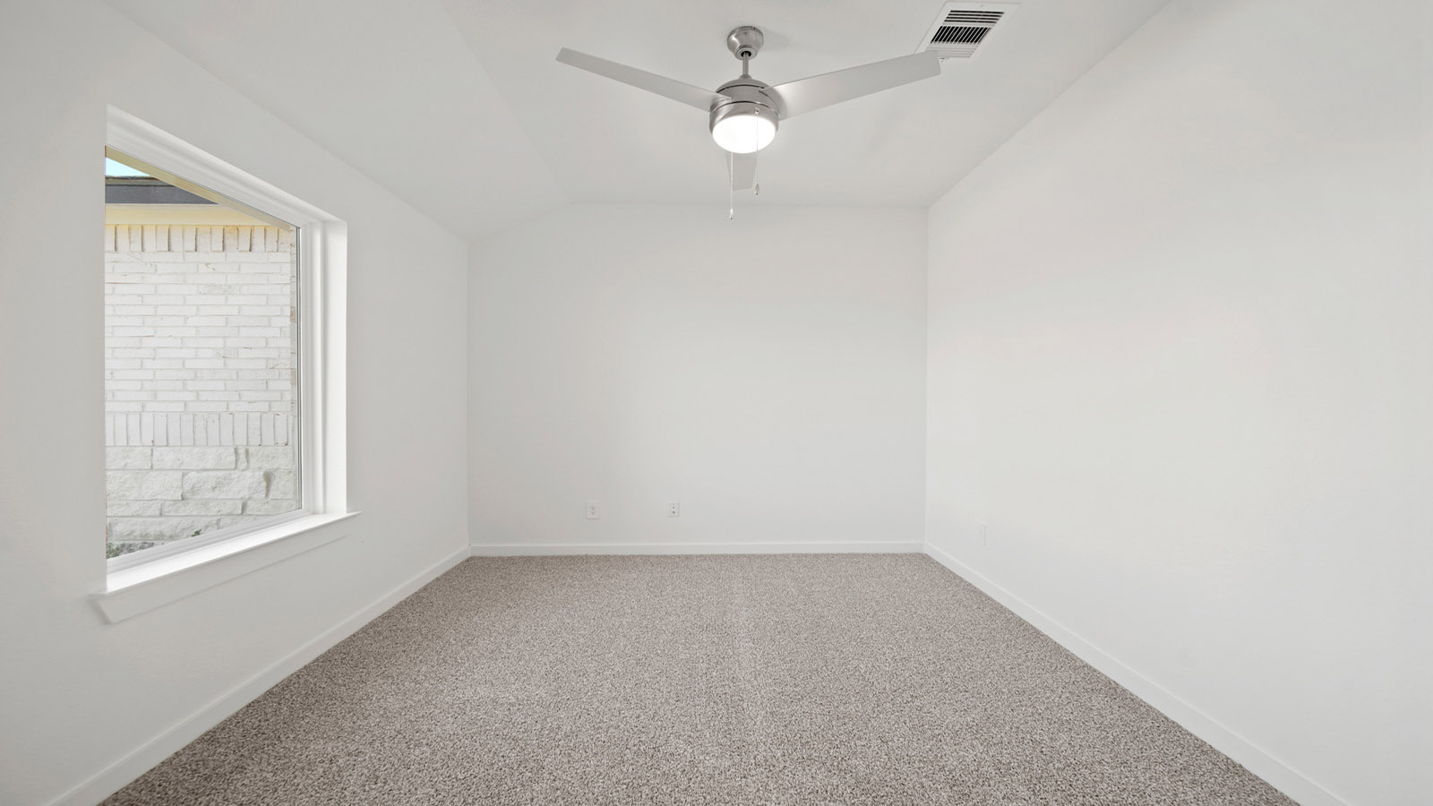 Secondary bedroom with bright window