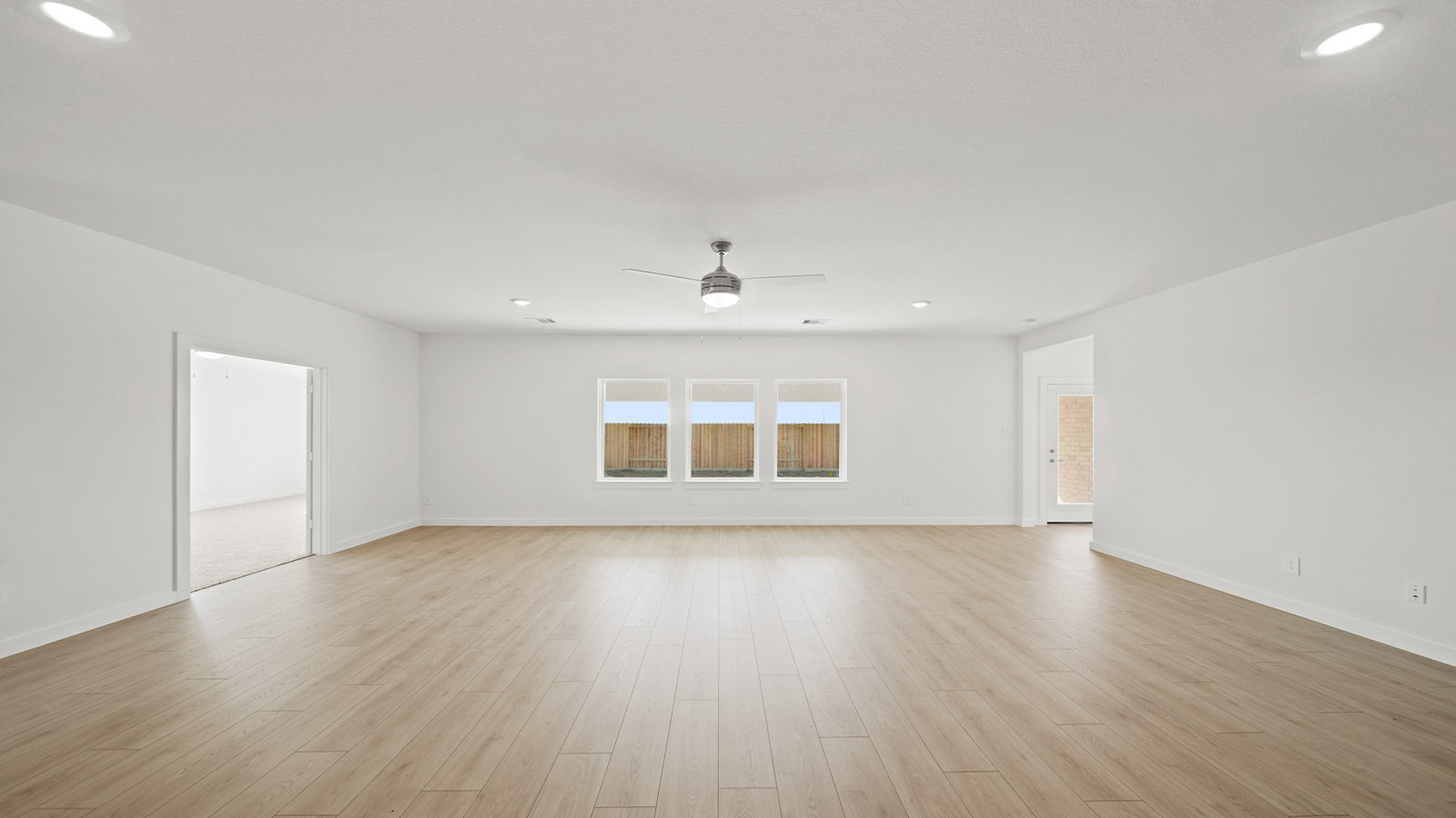 Open concept living, dining, and kitchen area