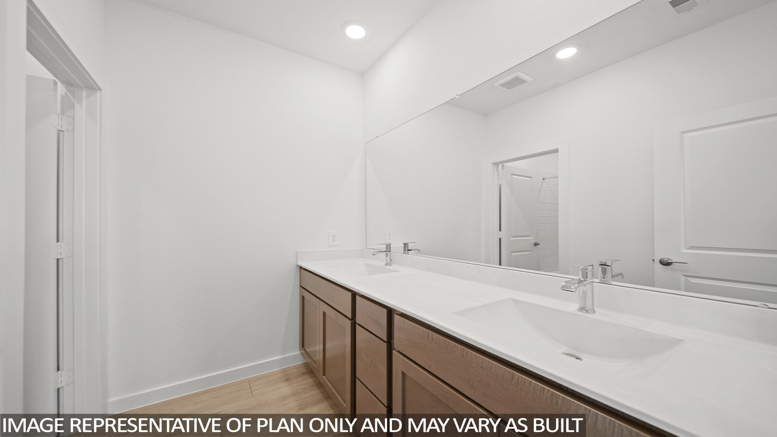 secondary bathroom with double sink