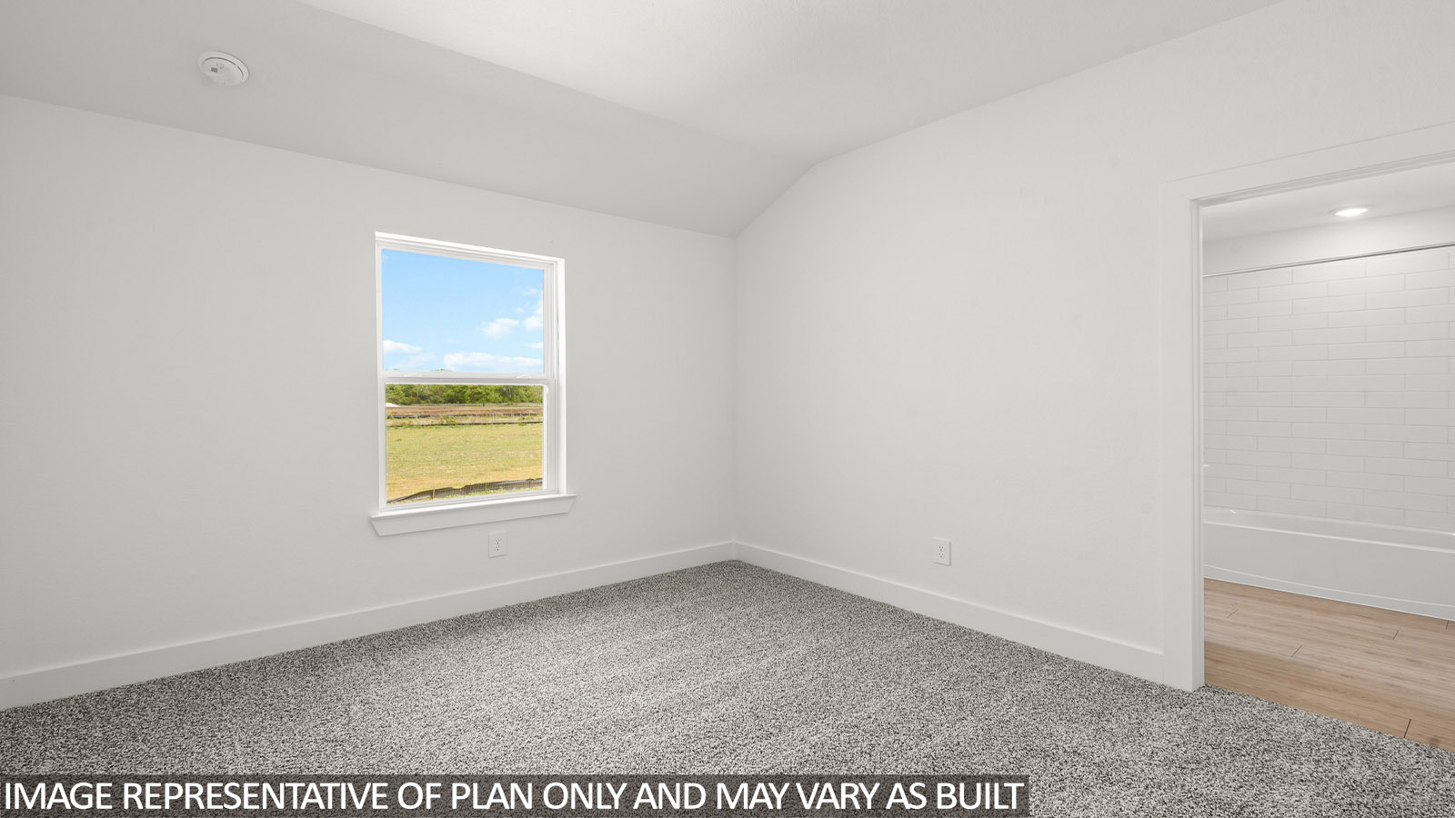 Secondary bedroom with bright window