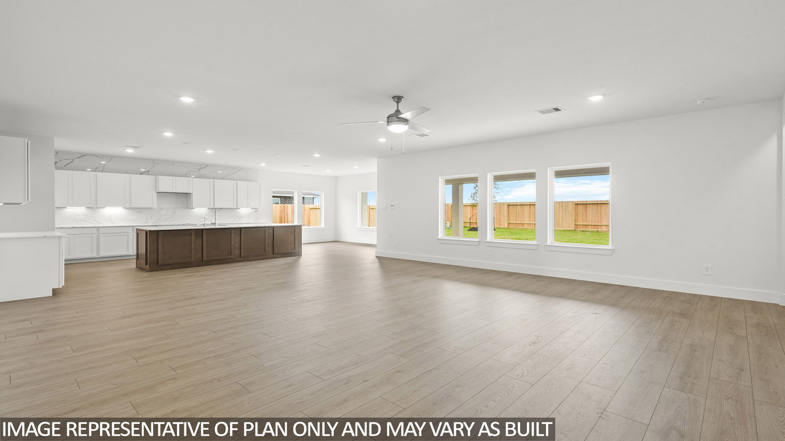 Open concept living, dining, and kitchen area