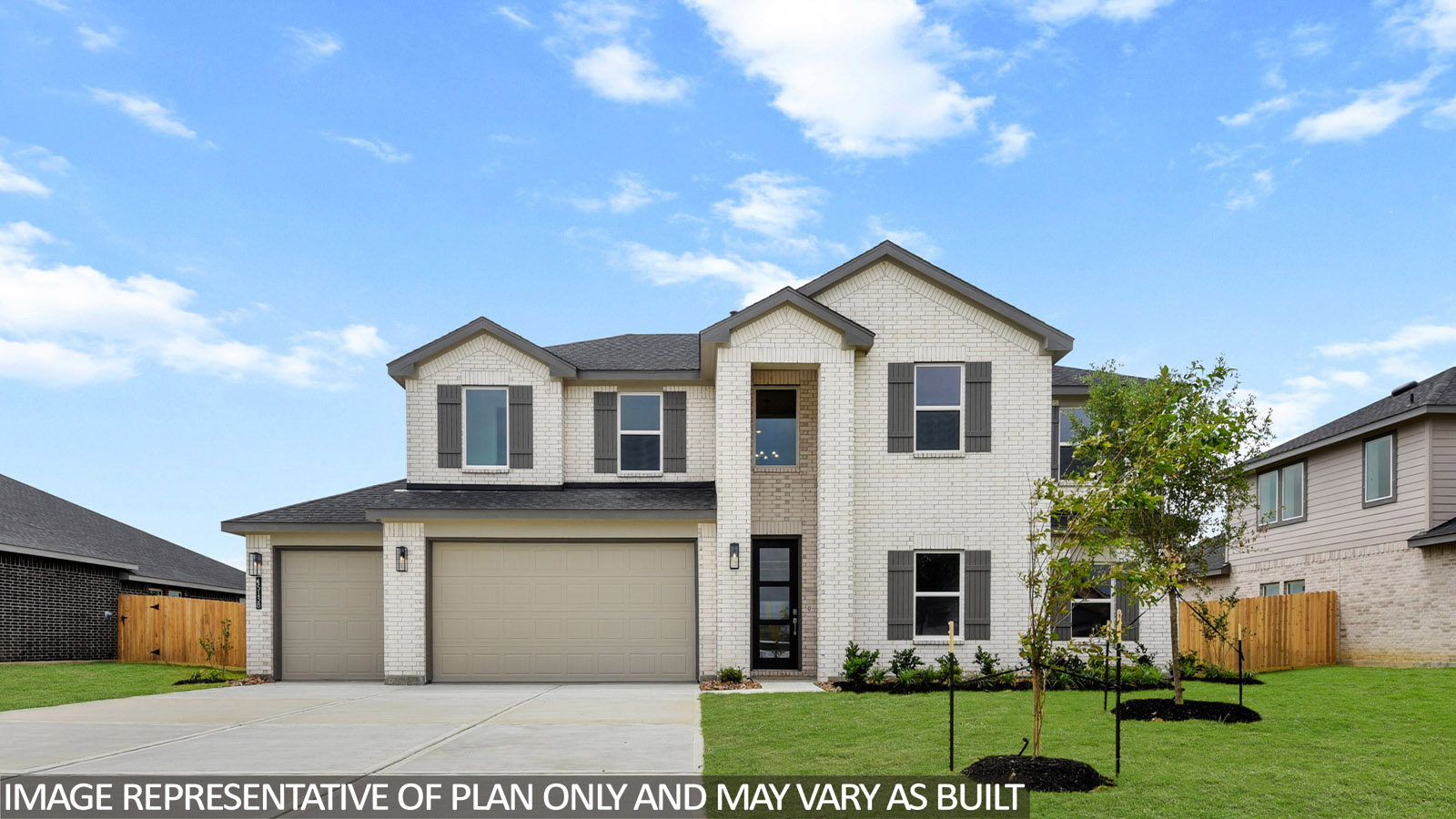 Two story home with three car garage