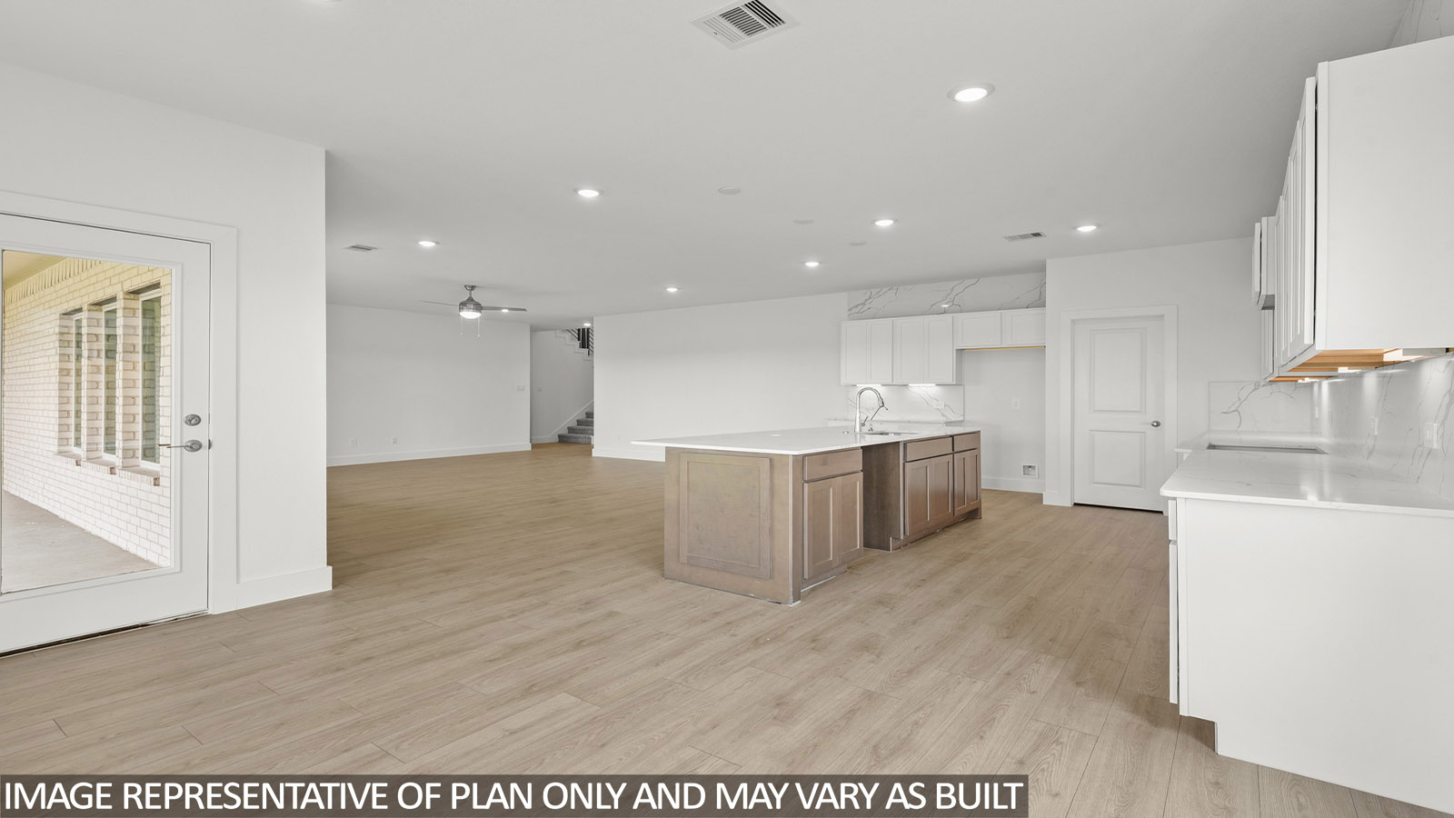 Open concept living, dining, and kitchen area