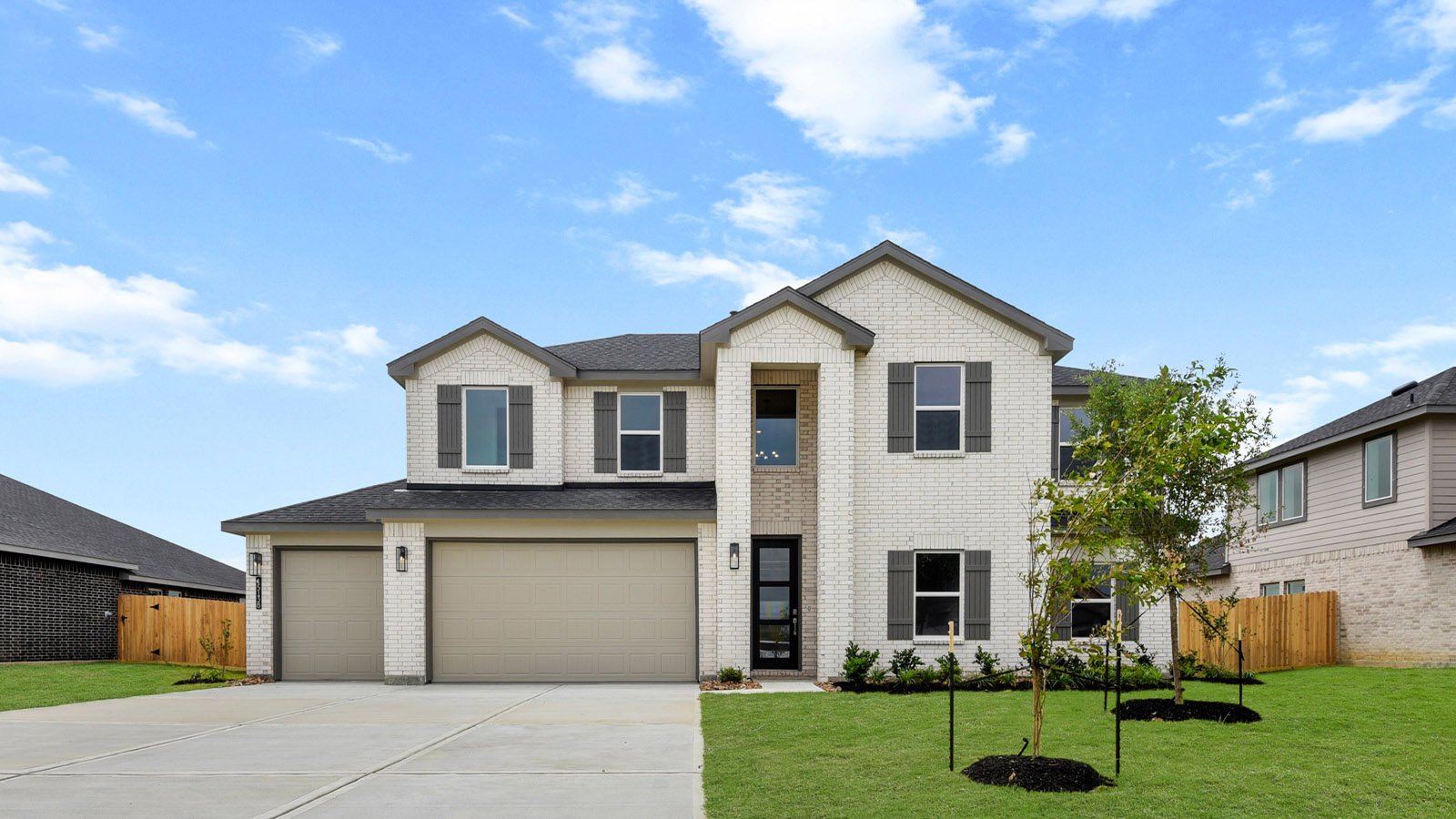 Two story home with three car garage