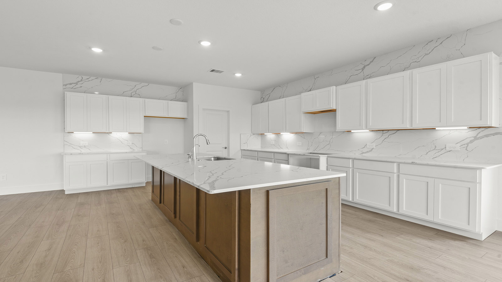 L- shaped kitchen with an island