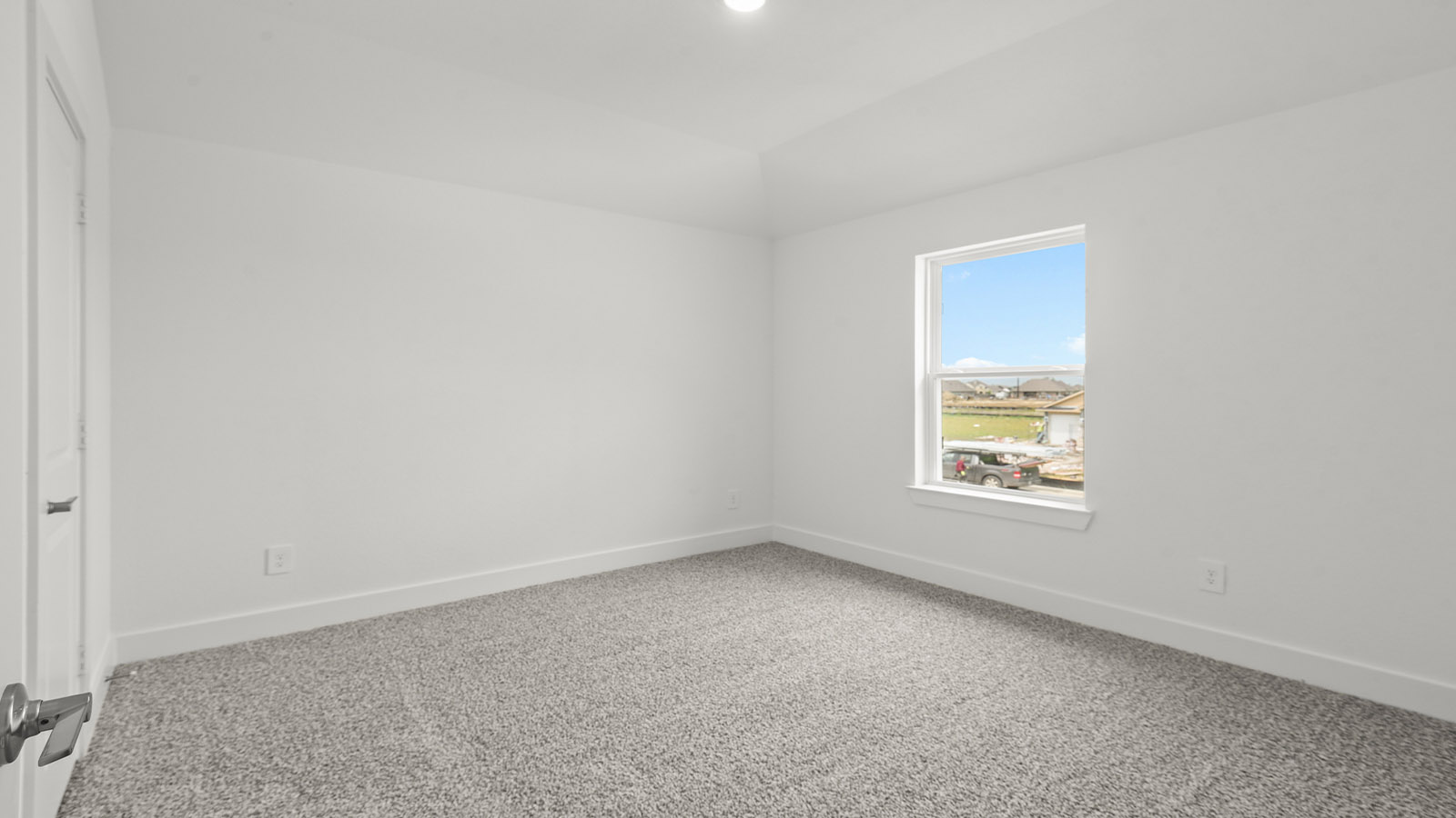 Secondary bedroom with bright window
