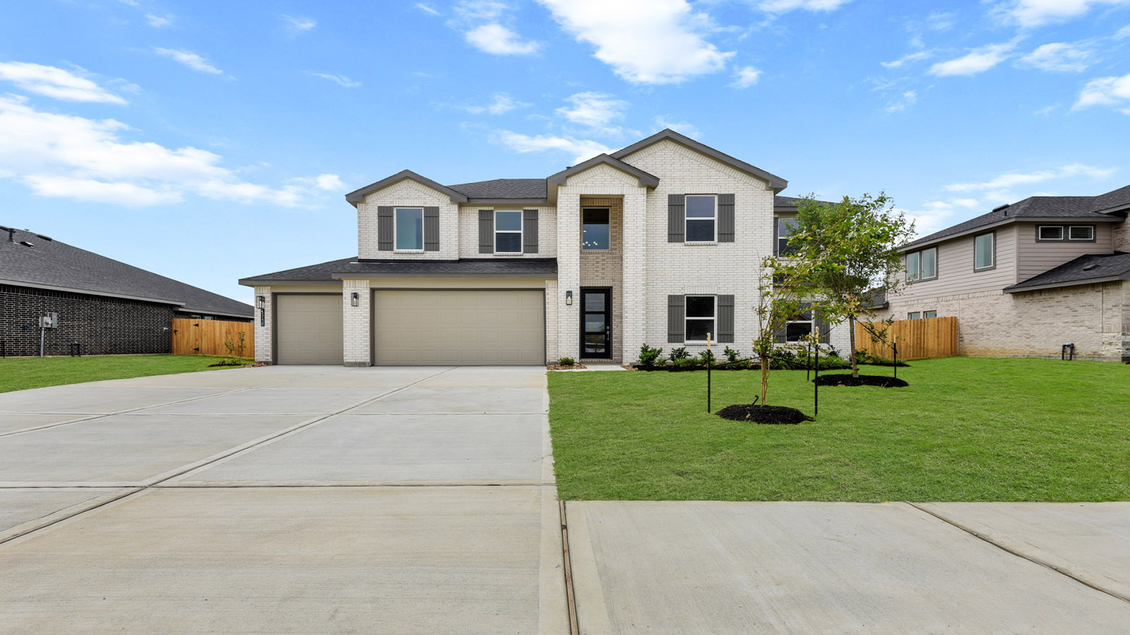 Two story home with three car garage