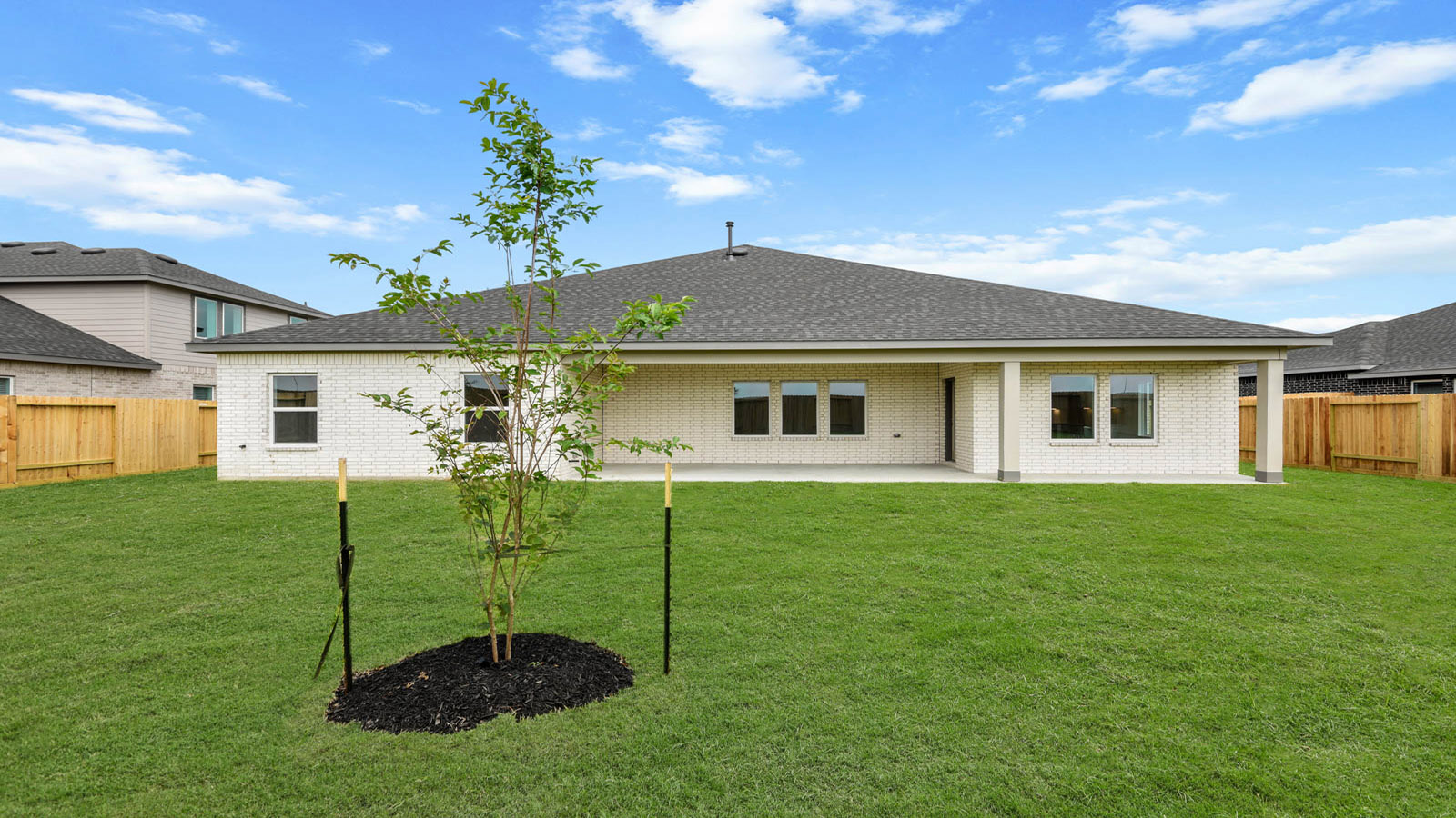 covered patio with overhead lighting