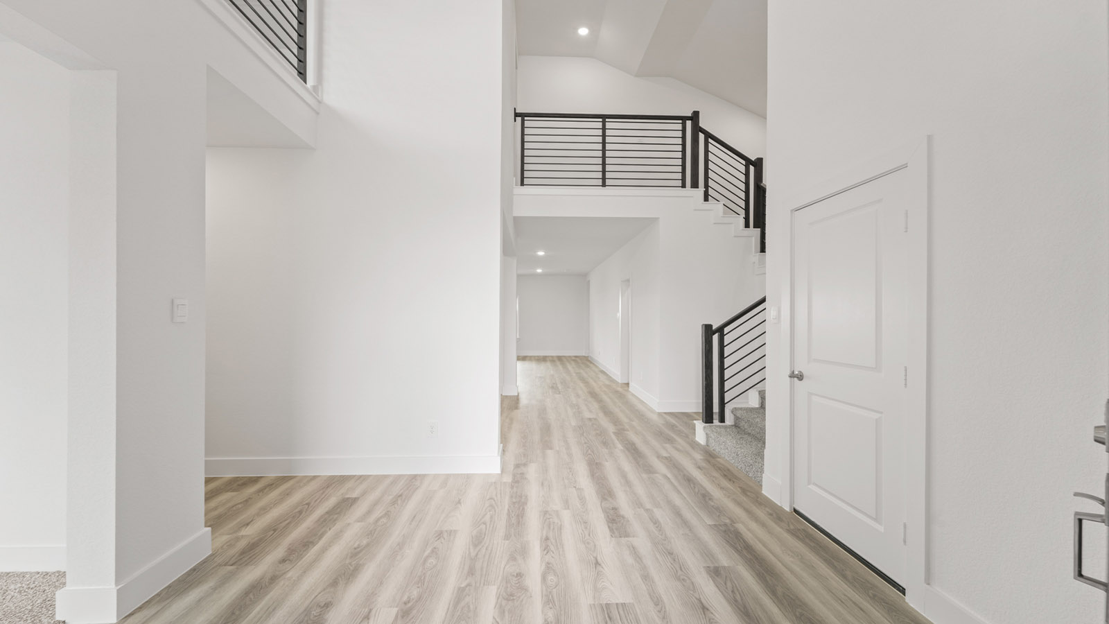 Entry hallway with vinyl flooring