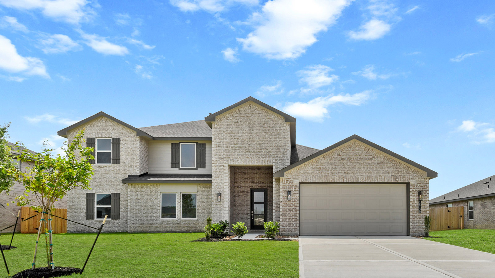 Two story home with three car garage