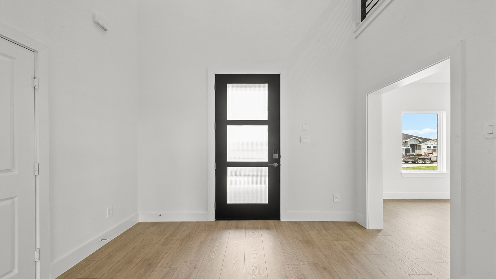 Entry hallway with vinyl flooring