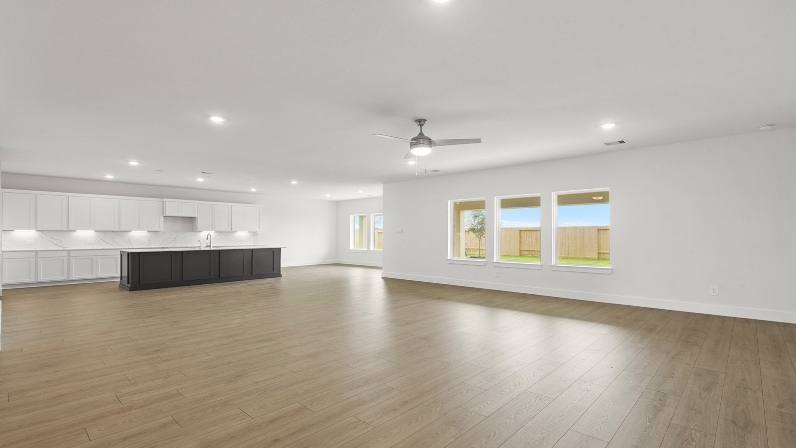 Open concept living, dining, and kitchen area