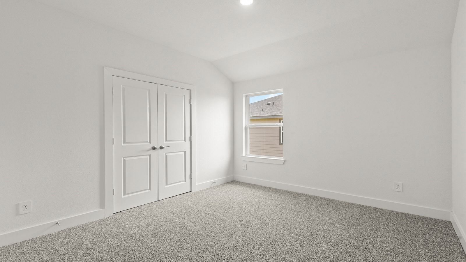 Secondary bedroom with bright window