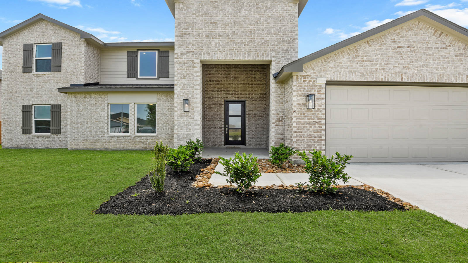 Two story home with three car garage