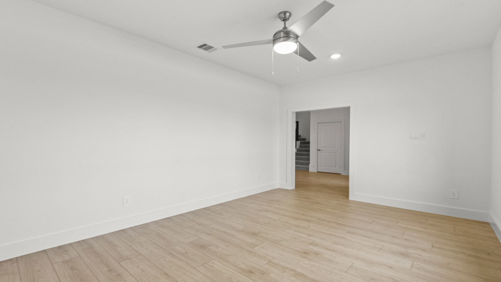 family room with vinyl flooring