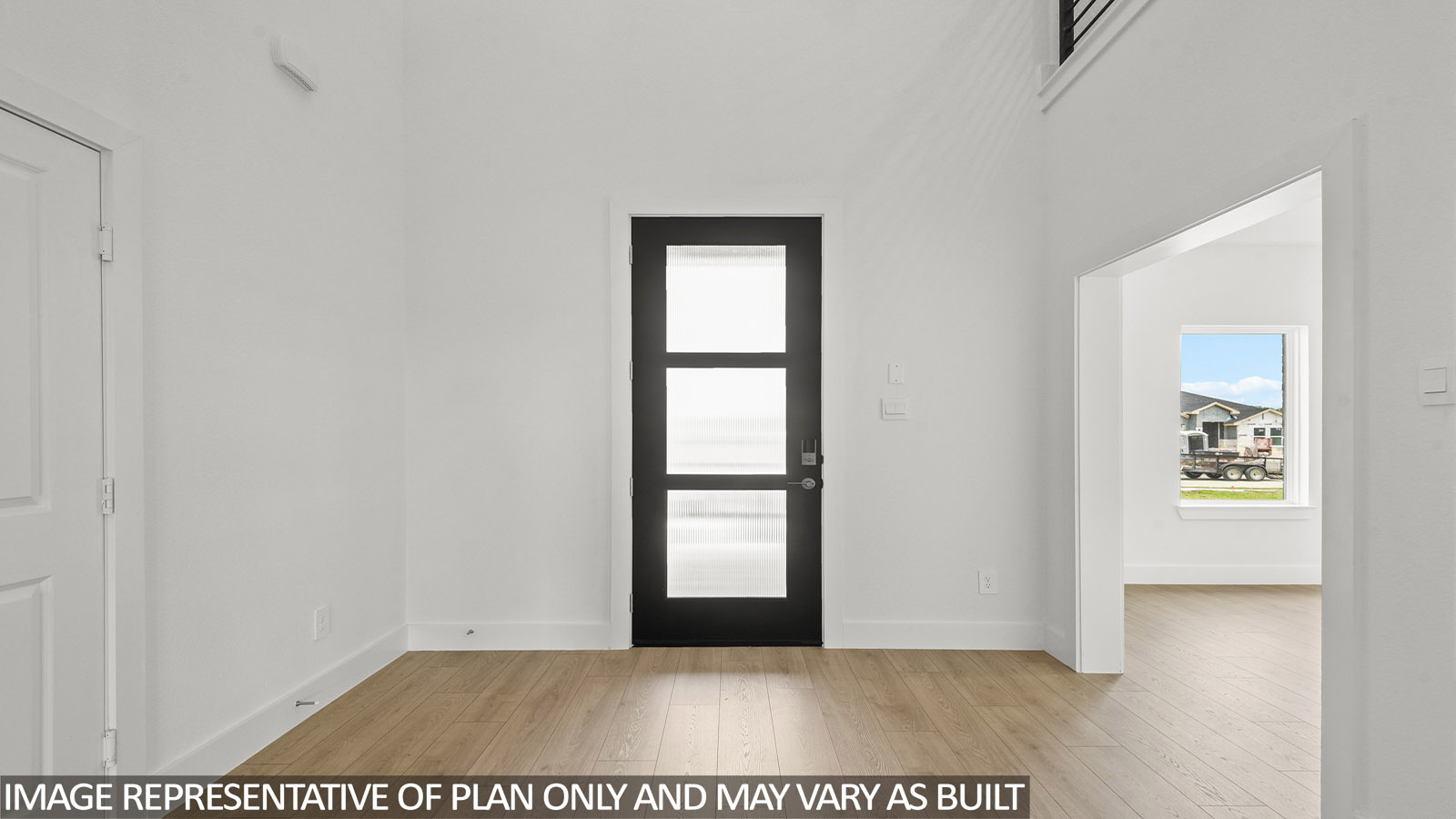Entry hallway with vinyl flooring