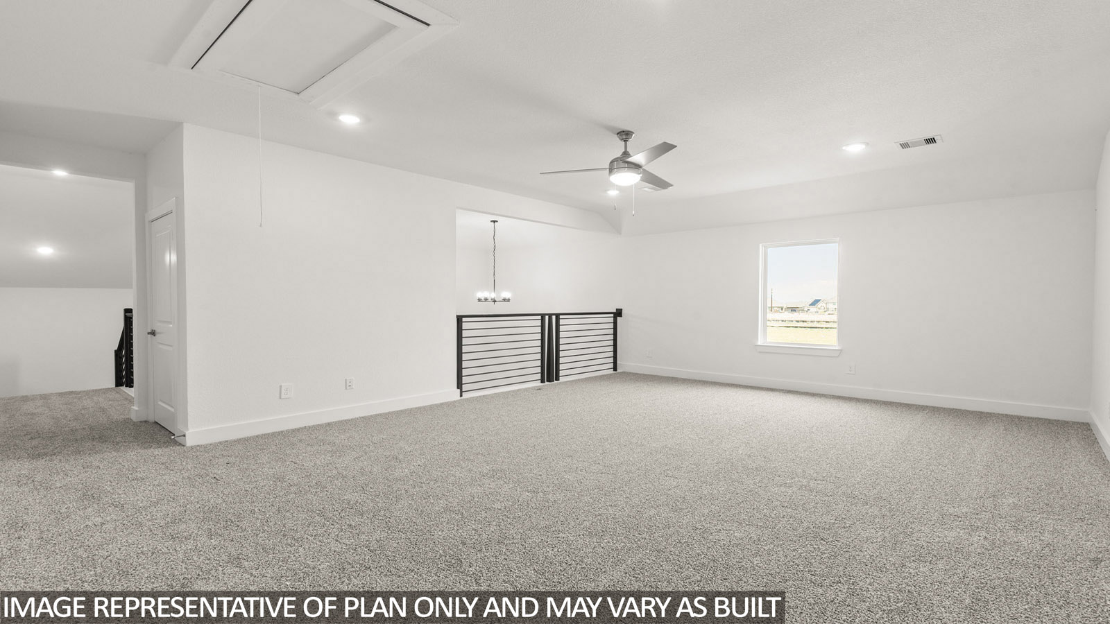 Second story game room with carpet flooring